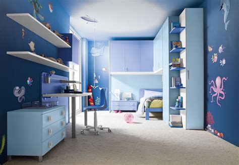 For more boy's bedroom ideas be sure to check out these inspirational boys' bedrooms. 15 Beautiful Dark Blue Wall Design Ideas