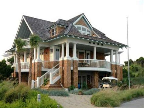 The beach is a typical vacation destination, and what better way to. beach house plans with porches pilings lrg elevated ...