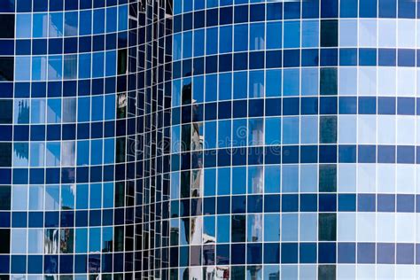 Glass Wall Of Modern Office Building With Sky Reflections Stock Image