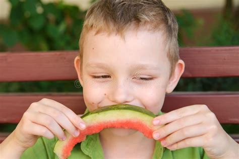 Funny Kids Eating Watermelon Outdoors In Summer Park Child Baby