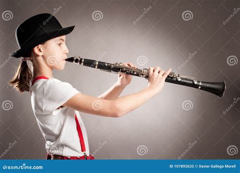 Little Girl Playing Clarinet Stock Image Image Of Grey Musical