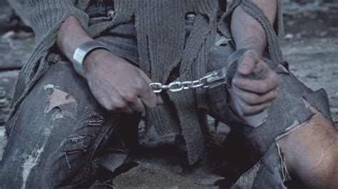 Prisoner In Chains On His Knees Stock Footage Videohive