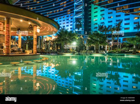 The Pool And Bar At The Jumeirah Beach Hotel At Night In Dubai Uae