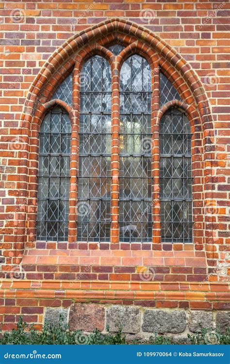 Window Of A Brick Gothic Building In Berlin Germany Stock Photo
