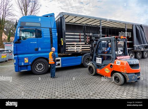 Freight Transport Professional Drivers In The Loading Zone Loading