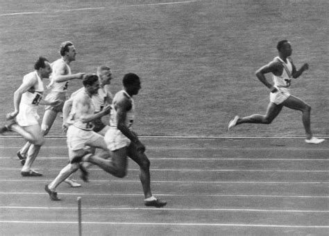On 1936 American Jesse Owens Wins Gold In The 100m During The Berlin