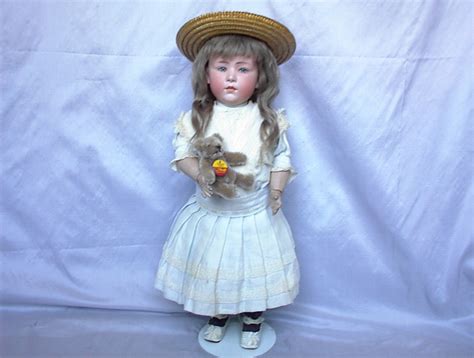 6) sarah's mother beamed with pride as she watched her win the race. Evelyn Phillips Antique Dolls : PAGE SEVEN