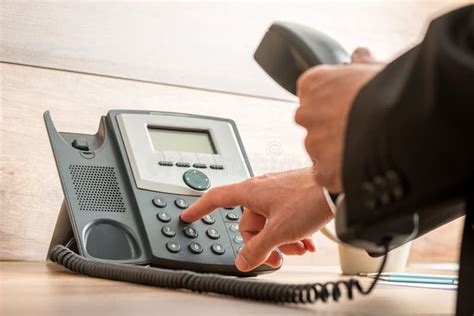 Man Dialing Out On A Landline Telephone Stock Photo Image Of Hand