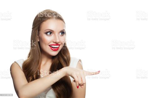 Happy Surprised Woman Model Pointing Finger Isolated On White Portrait