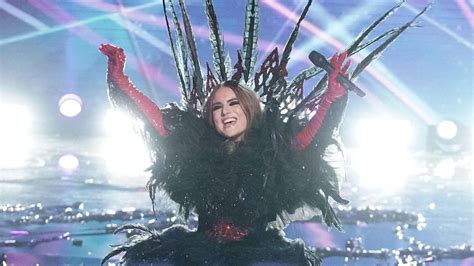 All Of The Masked Singer Season 5 Clues That Revealed Black Swans