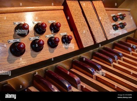Close Up Of Pipe Organ Pedalboard Toe Pistons And Expression Pedals