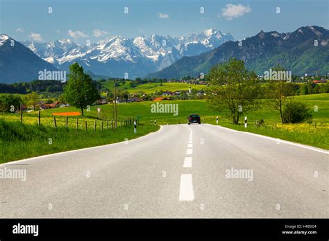 Germany Bavaria Country Road In Spring Stock Photo Alamy
