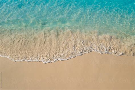 Aerial View Of Beautiful Idyllic Calm Turquoise Ocean On White Sand