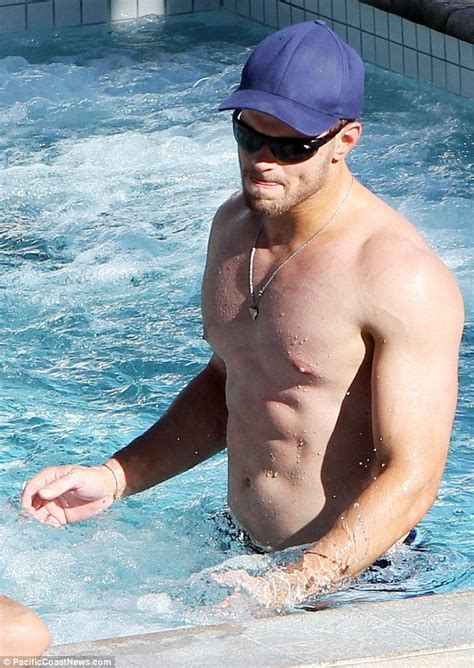 Kellan Lutz Shows Off His Impeccable Physique As He Relaxes Poolside Daily Mail Online