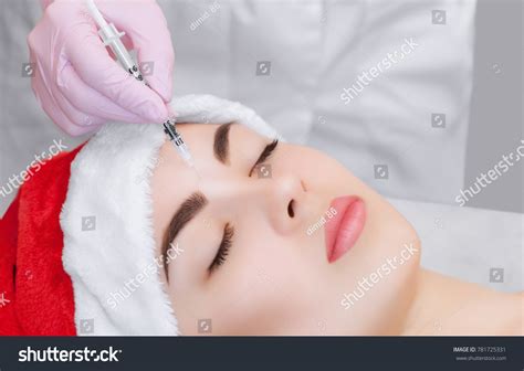 Cosmetologist Makes Botulinum Toxin Injection On Stock Photo 781725331