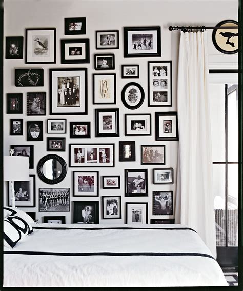 gallery wall of black and white framed photographs | Gallery wall inspiration, Inspiration wall ...