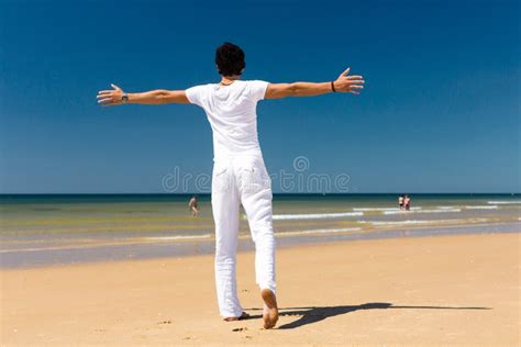 Handsome Man Standing In The Sun On Beach Stock Image Image 29398011