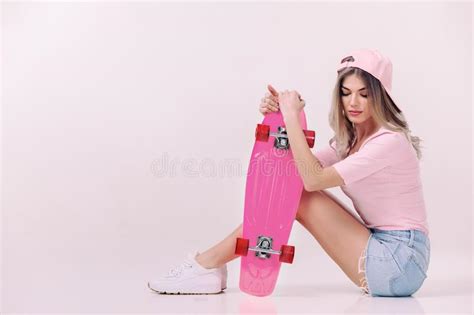 Beautiful Woman In White T Shirt With Pink Skateboard Stock Image Image Of Legs Denim 143228921