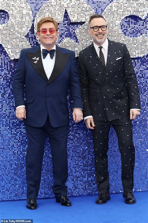 Elton John And His Husband David Furnish Look Dapper As They Attend Premiere For Rocketman In