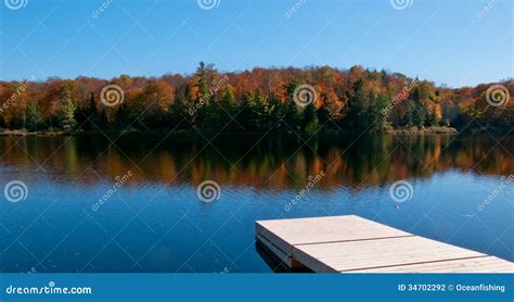 Wooden Dock On Autumn Lake Stock Photo Image Of Cottage 34702292