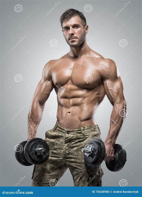 Muscular Athlete Bodybuilder Man With A Naked Torso On A Gray My Xxx