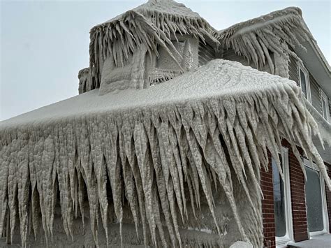 Photos Show Restaurant Covered In Giant Icicles From The Roof To The