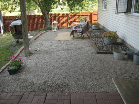 Canada day is coming up this this diy pea gravel patio is cheap and easy to make yourself! Happy At Home: A New Gravel Patio