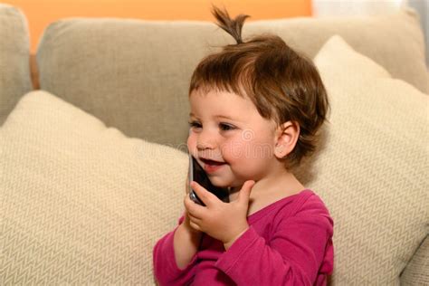 Baby Talking On Mobile Phone With A Smile Stock Photo Image Of Funny
