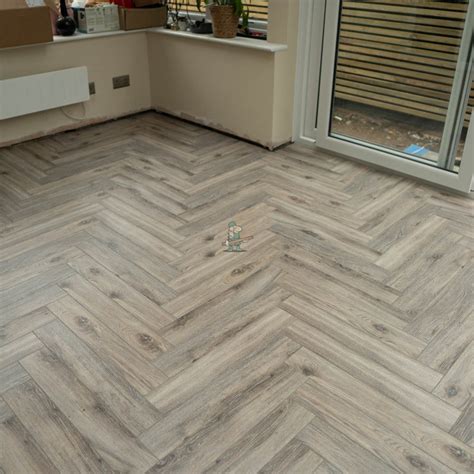 Fusion Herringbone 12mm Tornado Grey Oak 4v Laminate Flooring