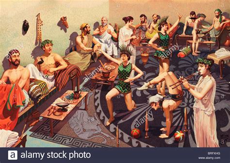 Ancient Greek Men Are Entertained By Female Performers At A Feast Stock