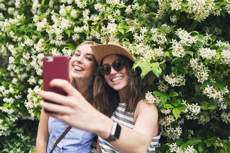 Two Friends Taking Selfies On Summer Vacation Girl Friends On Travel Adventure Taking Photos