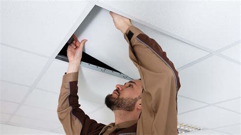 Fasten border tiles into place at the wall, driving three nails along each trimmed tongued edge. How to Install, Cut, Paint, Clean, and Replace Ceiling ...