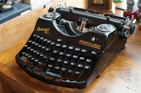 Azlan and the typewriter, kuala lumpur, malaysia. Rheinmetall Portable Ergonomic Typewriter