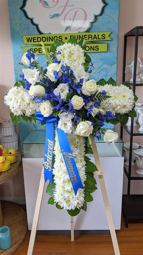 Sympathy Cross Blue And White By Chitas Floral Designs