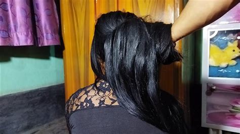 thick and long silky beautiful hair pulling gorgeous hair bun open and long hair pulling for