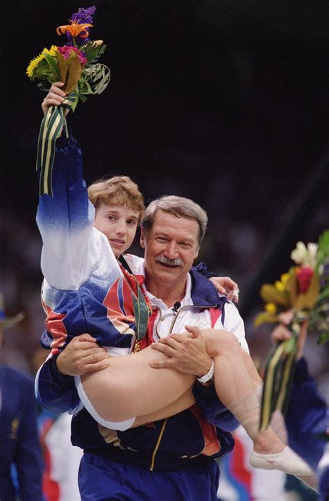 Us gymnast kerri strug (2nd l) screams in pain as she is carried from the floor by team officials after she injured her ankle during the women's team optionals in the olympic. More 30 for 30? 30+ Interesting Film Projects ESPN Should ...