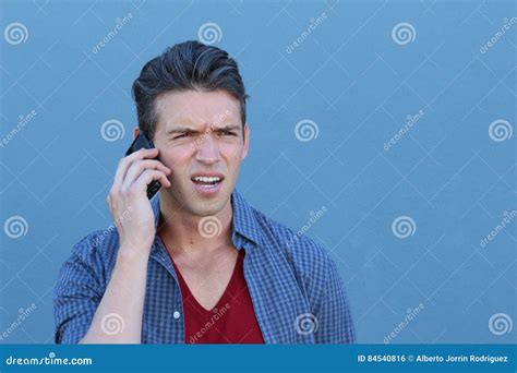 Man Showing Misunderstanding While Calling By Phone Stock Photo Image