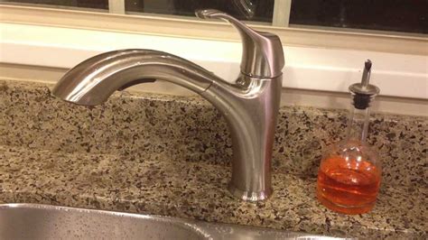 Insert a 2.5mm hex wrench into the small hole underneath the lever. REVIEW: Costco WR Water Ridge Pull Out Faucet Brushed ...