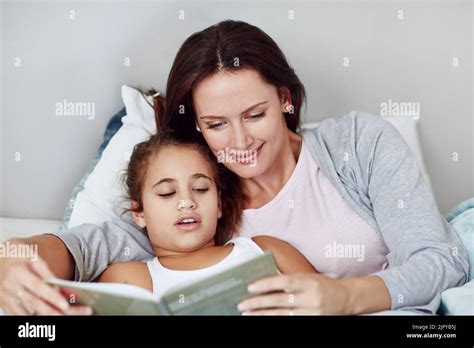 Woman Reading Bedtime Story Children Hi Res Stock Photography And