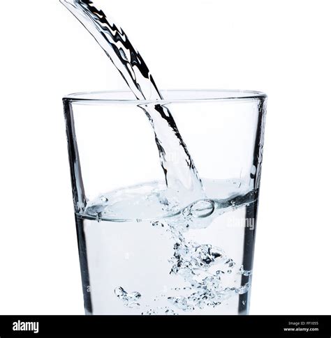 Water Pouring Into Glass Stock Photo Alamy