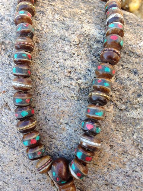 brown yak bone mala with turquoise coral and copper 9mm serenity tibet singing bowls