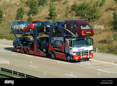 M25 Motorway New Vehicles On Delivery Transporter Lorry Stock Photo