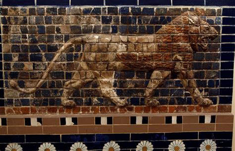 A Panel Composed Of Glazed Nicks Showing In Bas Relief A Lion