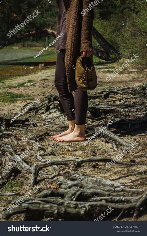 Faceless Woman Standing Barefoot On Lake Stock Photo Edit Now