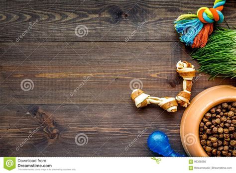 Download Large Bowl Of Pet - Dog Food With Toys On Wooden ...