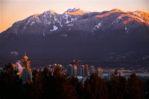 Vancouver Downtown Skyline With Snow Capped Mountains At S Flickr