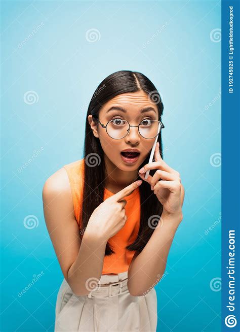 Asian Girl In Glasses Pointing With Stock Image Image Of Connection
