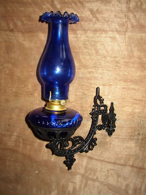 Beautiful Cobalt Blue Oil Lamp With A Cast Iron Wall Mount