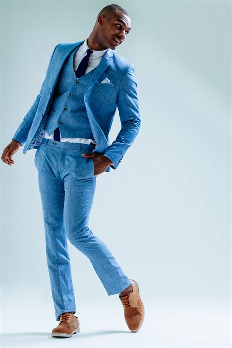 Each man should look great with his own particular style; Love the modern take of this blue linen suit -- men's suit ...
