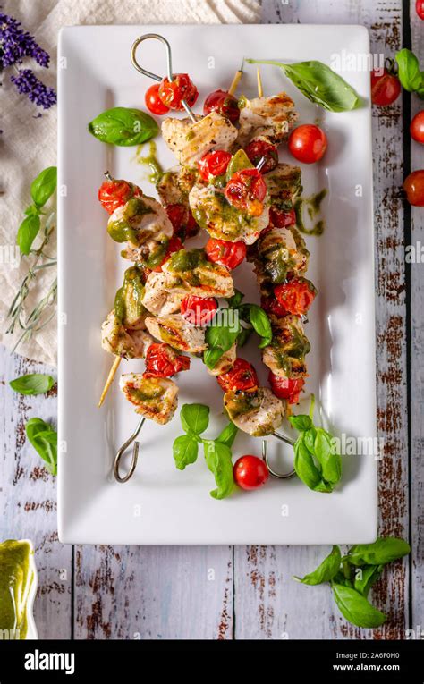 Chicken Shish Kebab With Fresh Basil Pesto Tomatoes And Garlic Stock
